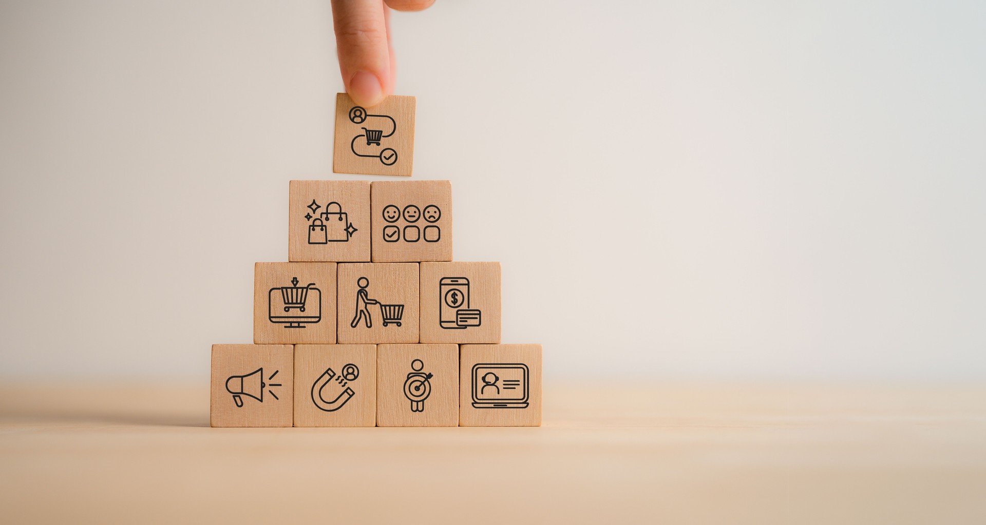 Customer Journey Concept. Wooden blocks with customer journey icons representing e-commerce, customer experience, marketing processes, online business, user engagement, and digital marketing strategy.